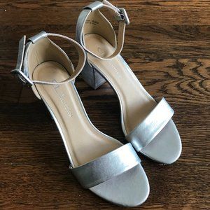Silver strappy sandals with a chunky heel